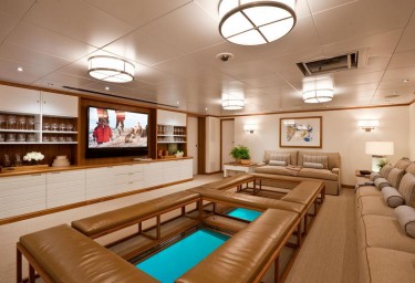 Luxury Expedition Yacht SURI Media Room with Glass Floor