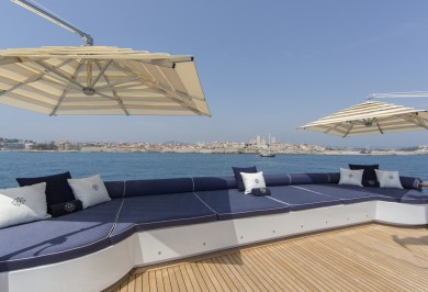 Luxury Yacht MOSAIQUE Bridge Deck with Sunpads for Onboard Relaxation